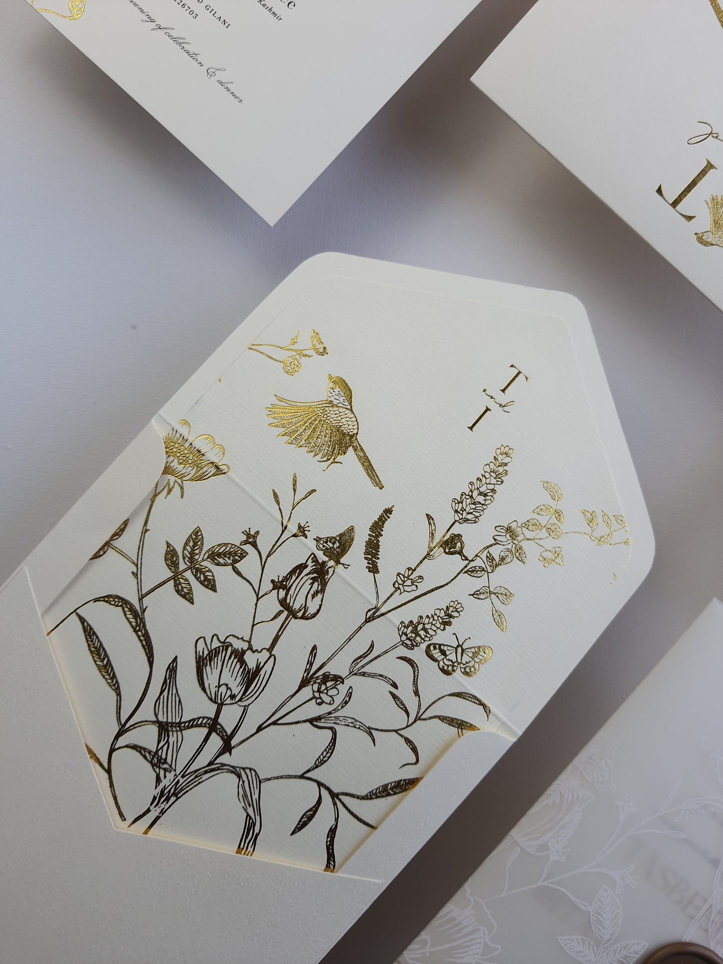 Foiled floral invitation